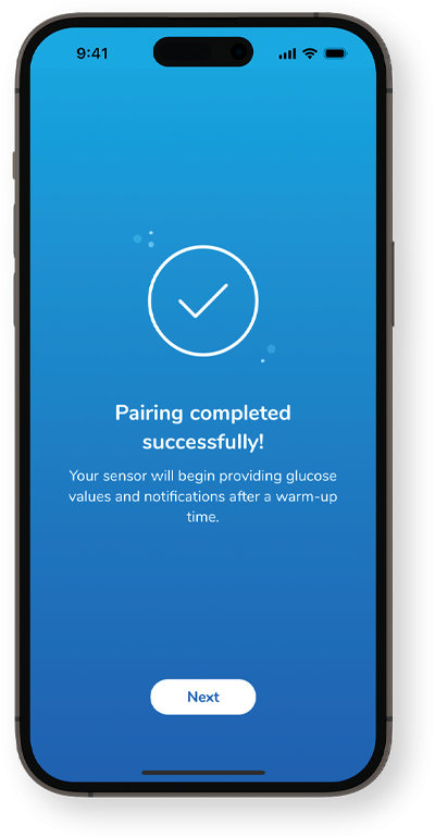 Pairing completed successfully screen, information about warm-up time and a Next button at the bottom.